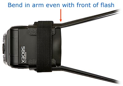 Align the bend in the arms with the front of the flash head.